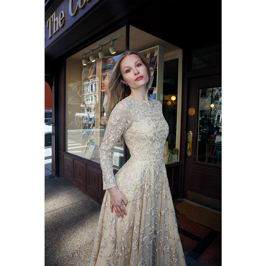 Lavanya Coodly Olympia pale gold tulle evening gown with intricate silk-thread hand embroidery, high neckline and sheer long sleeves.
