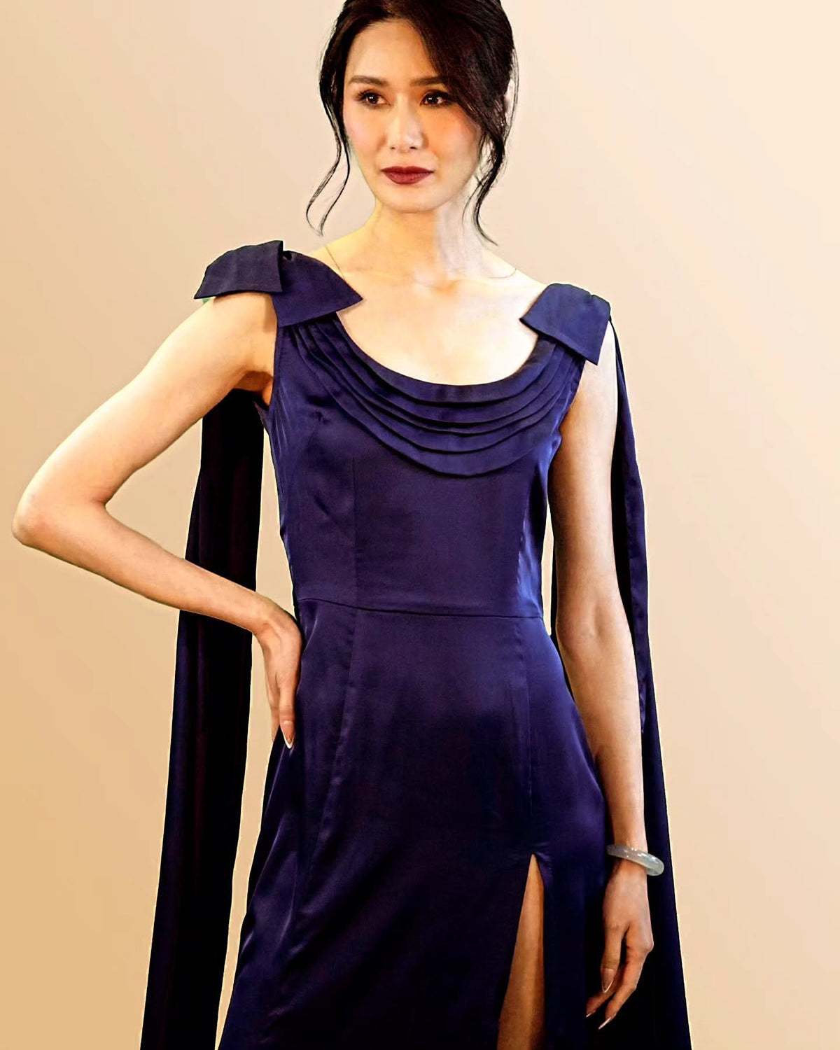 Asha sari-inspired pleated satin gown by Lavanya Coodly, close-up front view with draped shoulder detail