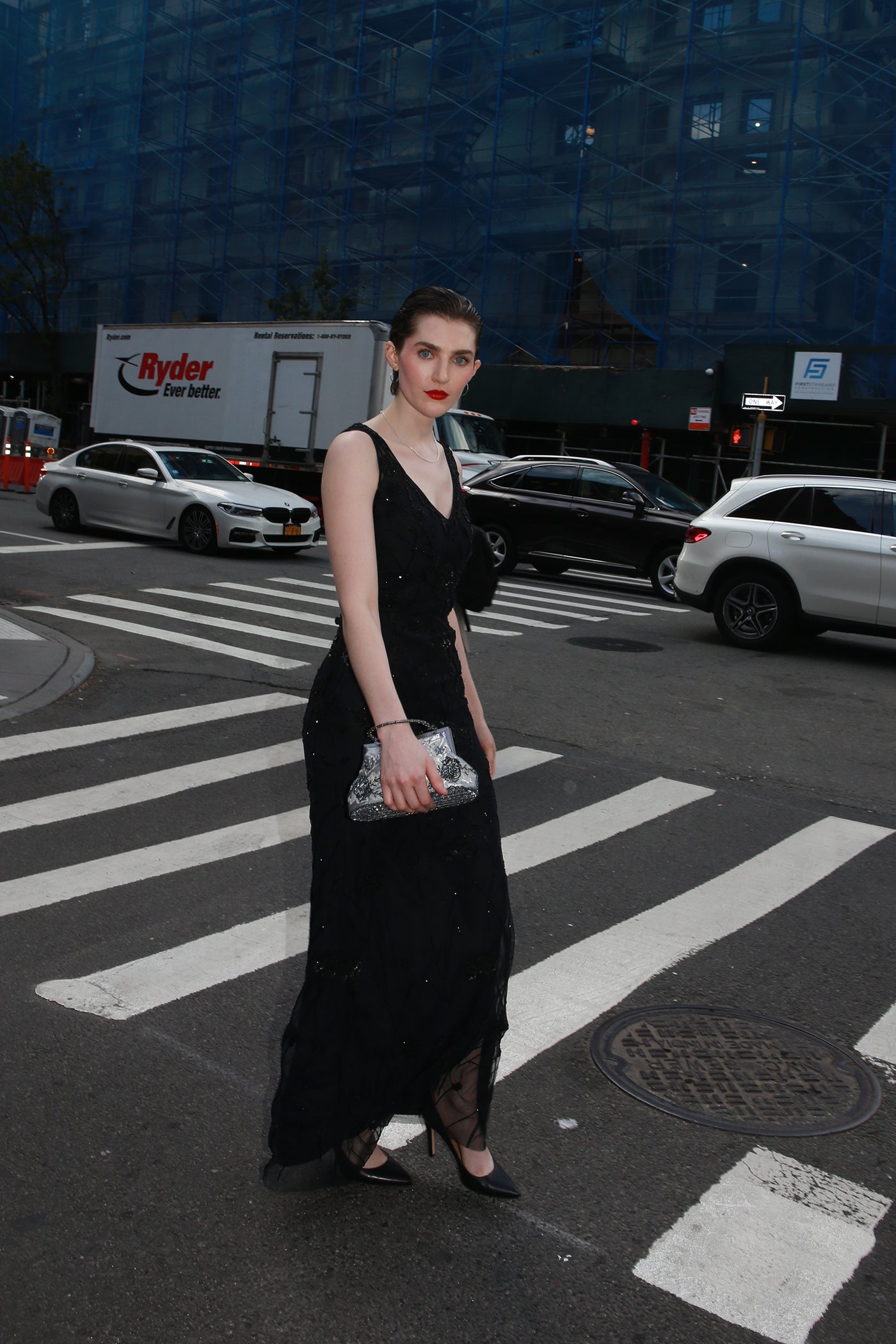 Faye black European tulle gown with handcrafted floral embroidery, three-quarter view