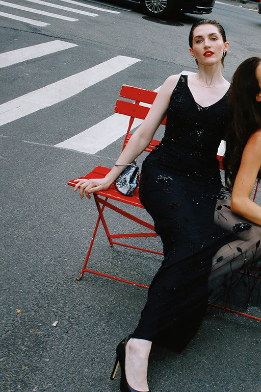 Faye black embroidered tulle gown by Lavanya Coodly, seated view on bench
