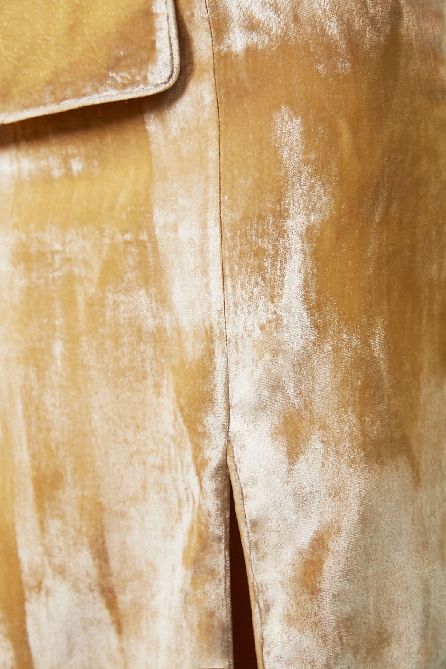 Detail of pale gold silk velvet and tailoring on the Lavanya Coodly Jillian gown